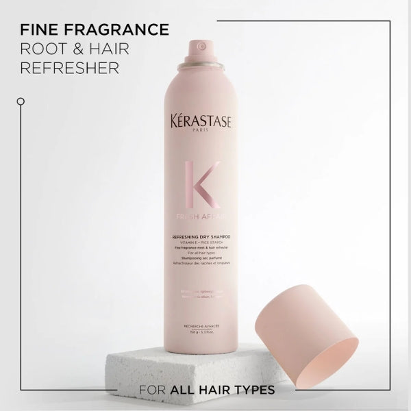 Kérastase dry shampoo bottle on a white background